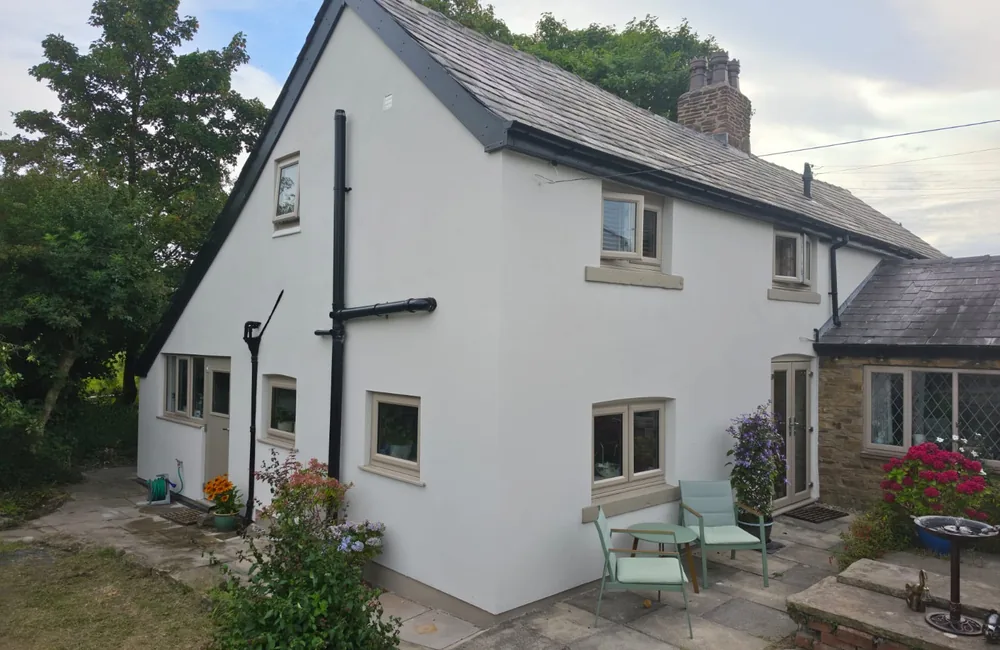 The same cottage after AJM Pro completed its exterior render